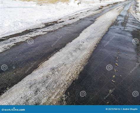 The Road With Melting Snow In Nature Stock Photo Image Of Dirt