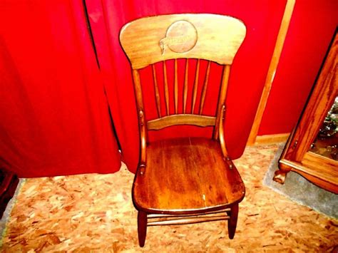 Antique Oak Schlitz Tavern Chair With The Schlitz Logo Engraved On The