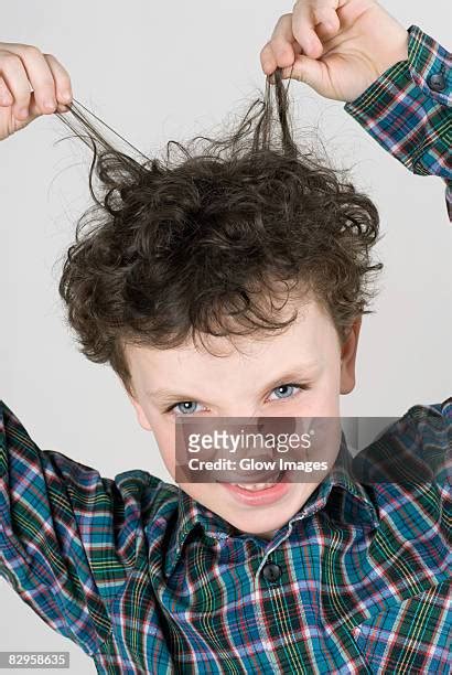 Boy Pulling Hair Photos And Premium High Res Pictures Getty Images