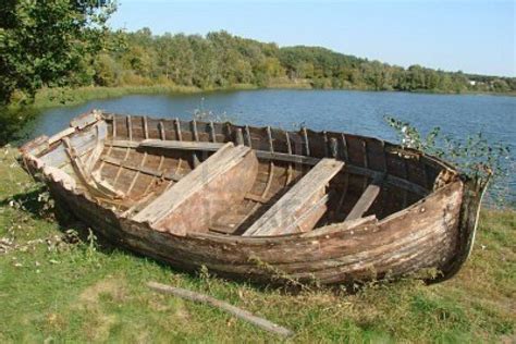 Ruined Vintage Wooden Boat On Riverside Royalty Free Stock Photo