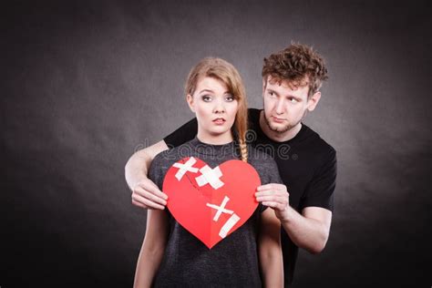 Sad Couple Holds Broken Heart Stock Photo Image Of Women