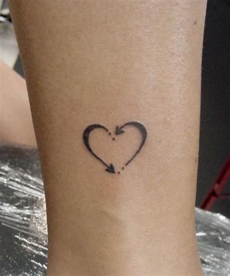 Arrows are associated with cupid, the god of love; 100 Delightful Heart Tattoos Designs For Your Love