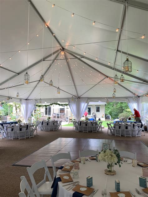 White Top Structure Tent With Laydown Floor And Astroturf Swagged