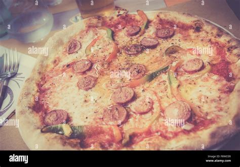 Genuine Italian Pepperoni Pizza In Tuscan Restaurant Stock Photo Alamy