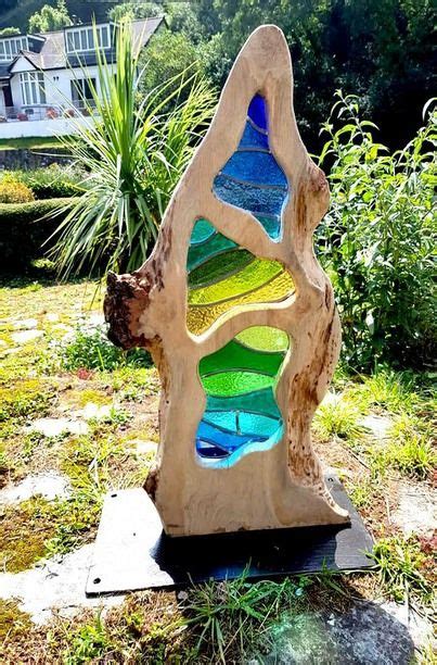 Stained Glass And Wood Sculpture Stained Glass Designs Stained Glass Projects Stained Glass