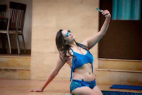 Stunning Pictures Of Actress Sanjana Singh Enjoying In A Pool Bikinis Actresses Fashion