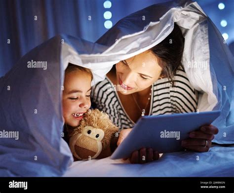 Woman Reading Bedtime Story Children Hi Res Stock Photography And