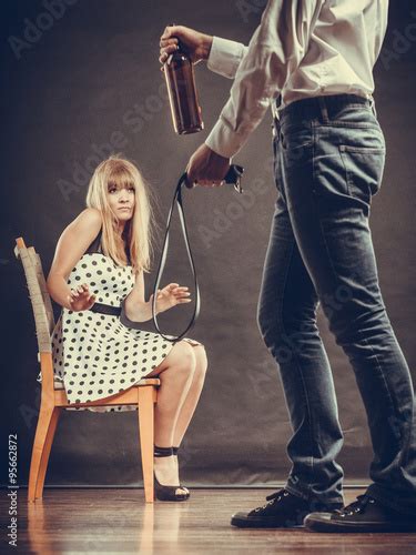 Man Alcoholic Beating His Scared Woman With Belt Stock Photo Adobe Stock