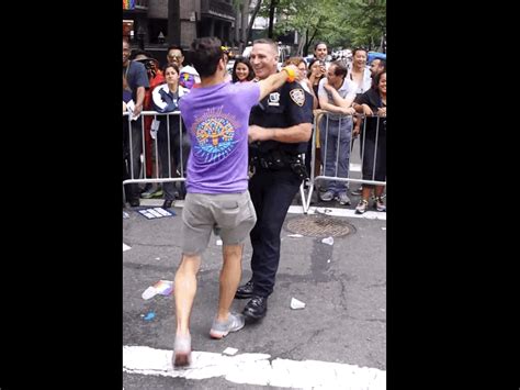 A Gay Pride Parade Marcher Got An Nypd Cop To Bust A Move With Him And