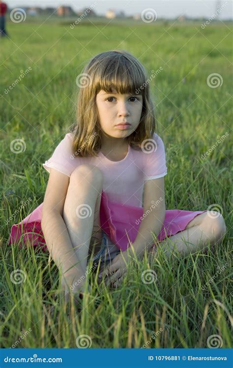 Cute Upset Boy Thinking In The Park Royalty Free Stock Photo