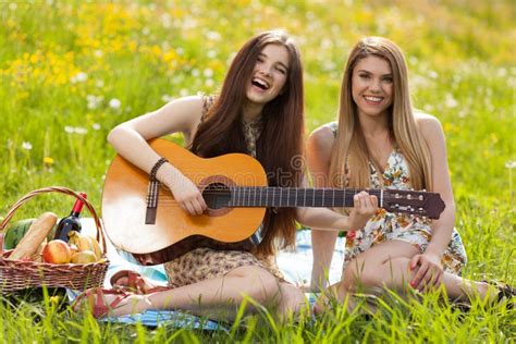 Two Beautiful Young Women On A Picnic Stock Image Image Of Outdoor Music 55192961
