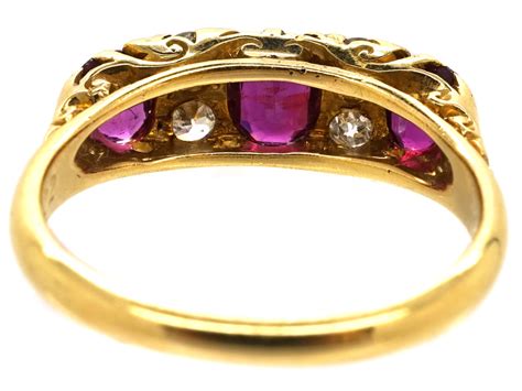 Edwardian 18ct Gold Three Stone Ruby And Diamond Carved Half Hoop Ring