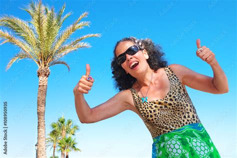 Mature Woman Over 50 With Thumbs Up Holiday Stock Photo Adobe Stock