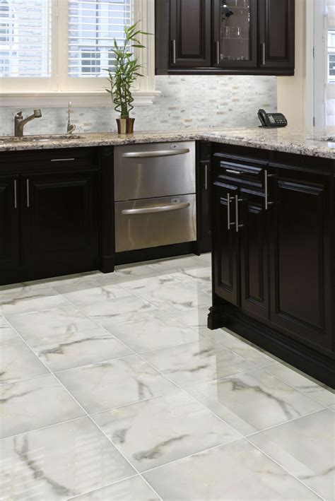 The calacatta collection mimics the look of white italian marble, featuring delicate veining and subtle variation. Calacatta Gold 24X24 Polished Porcelain - Floor Tiles USA