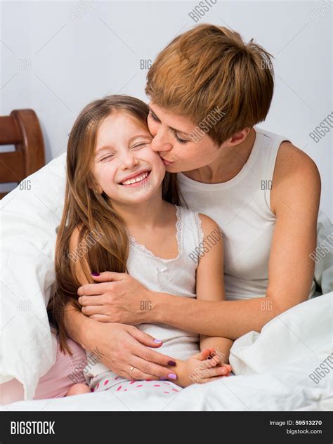 Mother Kisses Her Image And Photo Free Trial Bigstock