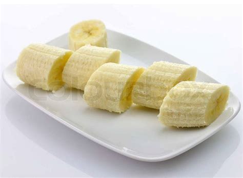 Freshly Sliced Bananas On A Plate Stock Photo Colourbox