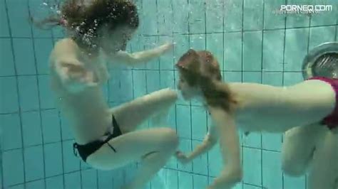 Two Playful Teens Are Swimming Naked And Hugging Underwater Porneq