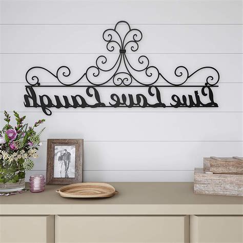 Choosing art that's too small is a very common mistake. The Best Choose Happiness 3D Cursive Metal Wall Decor