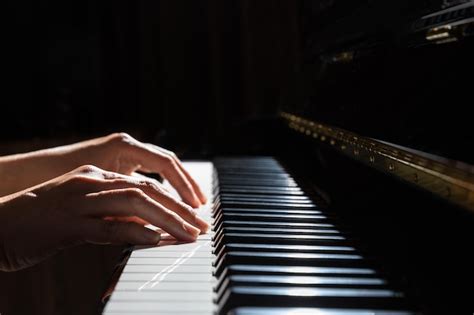 Premium Photo | Person playing piano