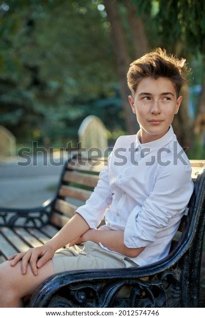 Happy Teenage Boy Sitting Park On Stock Photo 2012574746 Shutterstock