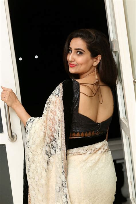 beauty galore hd anchor manjusha milky hot back and stunning figure showing in white saree