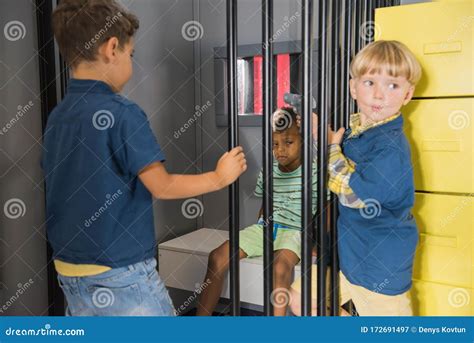 Kids Playing Police And Prisoner Stock Image Image Of Jail City