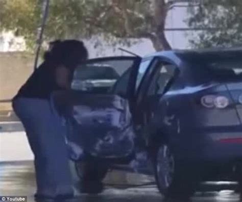 Woman Filmed At A Car Wash Cleaning Outside And Inside Her Vehicle With