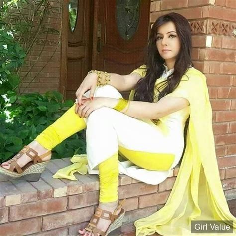 Pakistani Girl In White And Yellow Salwar Kameez