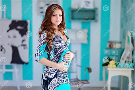 Portrait Of A Very Beautiful Pregnant Girls With Big Eyes And Go Stock