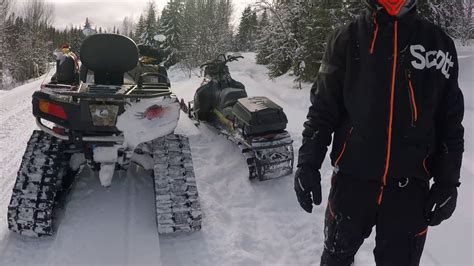 Atv With Tracks On A Search With A Suprising Spinn On The Ice Trail