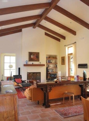 This consists of the main beam that runs through. .terracotta tile and beams across the ceiling! | Vaulted ...