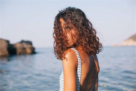 Woman Standing In The Sea By Stocksy Contributor Mak Stocksy