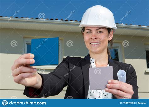 Female Architect Picking Exterior Color For Project Stock Photo Image