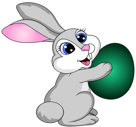 Easter Bunny Holding An Egg Clip Art Library