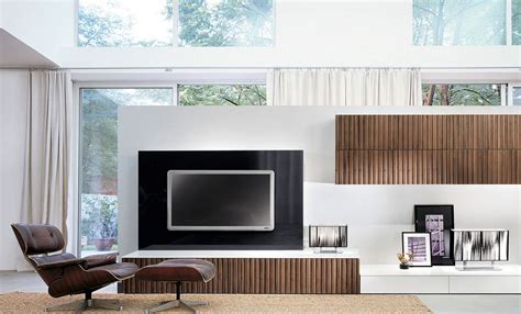 The book shelves beside the tv console add utility and emphasize the vertical nature of the space. Modern Luxury Wall Tv Unit | Living room tv, Modern wall ...