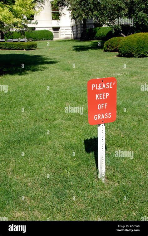 Red Sign With White Letters Reads Please Keep Off Grass Stock Photo Alamy