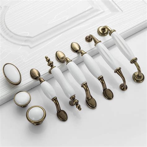 Our experience allows us to take great pride and care in designing and manufacturing cabinets for the heart of your home, your kitchen! White Ceramic Door Handles European Antique Furniture ...