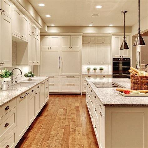 Unerring style defines this classic, softly shaded white. creamy white shaker kitchen cabinets painted Benjamin ...