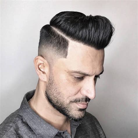 The mid fade haircut offers a perfect balance between a reduced fade and high fade. Mid Fade Haircuts