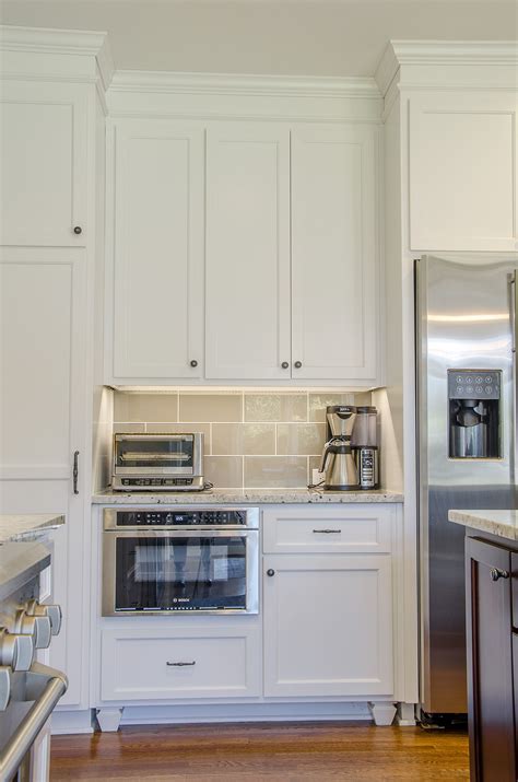 Floor To Ceiling Custom White Kitchen Cabinets With Stainless Steel