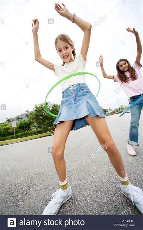 Two Young Girls With Hoops Stock Photo Royalty Free Image 11833574