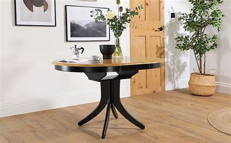 Extending Glass Dining Table Round Vida Extendable Modern Round Dining Table Southern