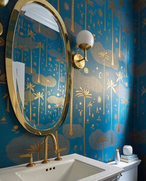 Striking Blue And Gold Wallpaper Accents An Elegant Contemporary Powder