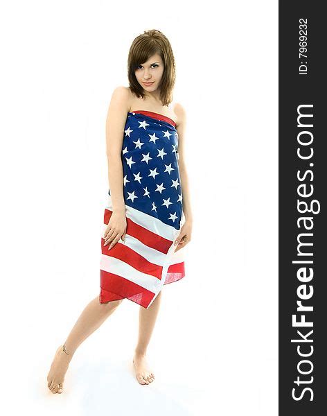 Beautiful Girl Wrapped Into The American Flag Free Stock Images