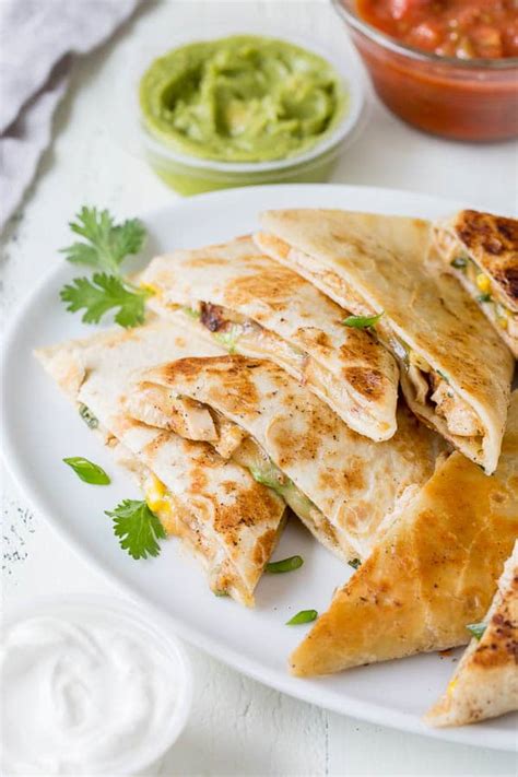 Creamy chicken and cheese filling in tortillas cooked until crispy. 30-Minute Cheesy Chicken Quesadillas ~Sweet & Savory