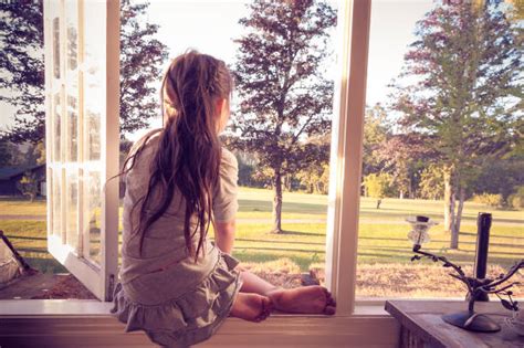 Best Girl Looking Out Window Stock Photos Pictures And Royalty Free