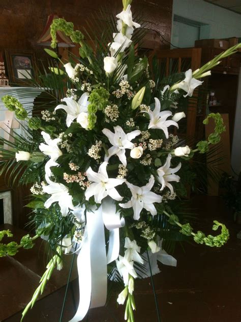 At ftd, we have a variety of beautiful floral funeral wreaths you can the size of the spray or wreath does not necessarily determine its price. White Funeral Spray with my favorite flower---Bells of ...