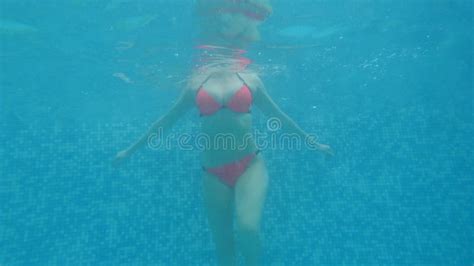 Woman Underwater A Woman With Big Breasts Floating Under The Water Underwater Photography