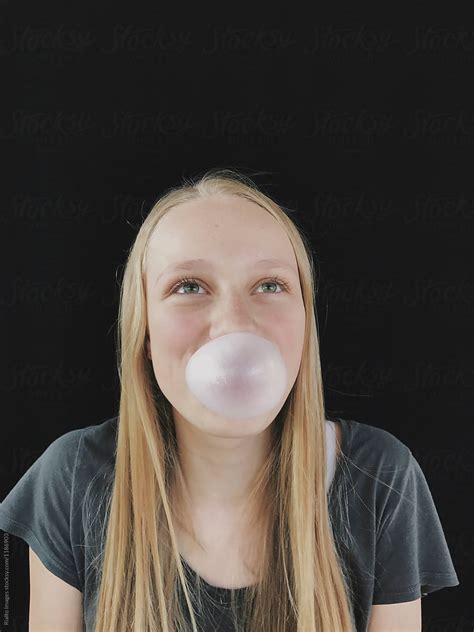 Teenage Girl Blowing Bubble Gum Bubble By Stocksy Contributor Rialto Images Stocksy