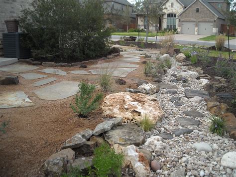 Front Yard Landscape Dry Creek Bed With A Natural Flagstone Patio Set